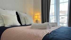 Appartements La Vie en Rose & Bleue - Louez L-Esprit Libre ! : photos des chambres