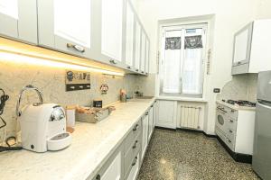 L Atelier comodo al centro - Parcheggio privato - Zona Ospedale San Martino