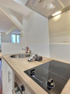 Appartements Cote Cour de Miss K : photos des chambres