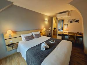 Hotels Logis Loire Hotel - Les Cocottes Restaurant : photos des chambres