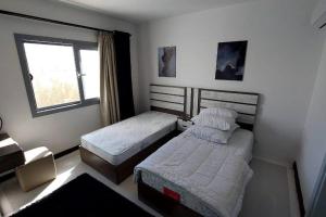 Modern chalet at el gouna Swan Lake compound with Swimable lagoon view