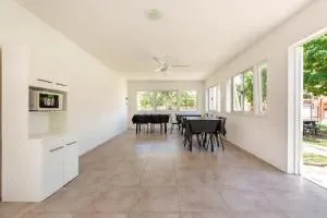 Departamentos con baño privado en complejo turístico - Вилья-Бельграно