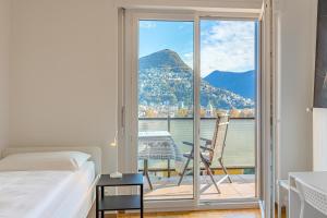 Imperial of Lugano 4 with a lake view behind the station and 10 min from the lake