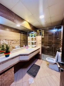 Shared Stylish One-Bedroom with Ensuite in Sharjah