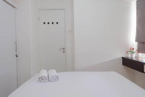 Cozy and Best Deal 2BR Bassura City Apartment By Travelio