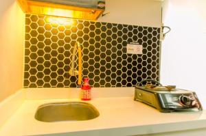 Comfort Living 1BR with Extra Room Apartment at MT Haryono Residence By Travelio