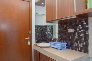 Nice and Comfy Studio Apartment Capitol Park Residence By Travelio