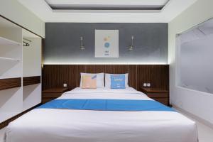 Sans Hotel Rumah Kita Daan Mogot by RedDoorz