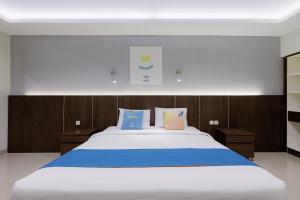 Sans Hotel Rumah Kita Daan Mogot by RedDoorz