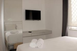 Comfort 2BR Apartment at Mediterania Palace Residence By Travelio