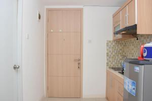 Cozy and Strategic Studio at Bassura City Apartment By Travelio