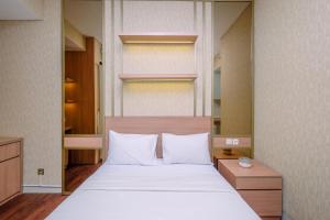 Cozy Studio at Transpark Cibubur Apartment By Travelio