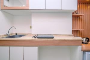 Cozy Studio at Transpark Cibubur Apartment By Travelio