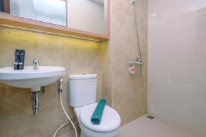 Cozy Studio at Transpark Cibubur Apartment By Travelio
