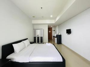 Cozy Studio Room at Dago Suites By Travelio