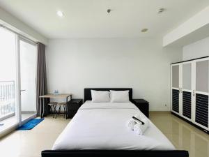 Cozy Studio Room at Dago Suites By Travelio