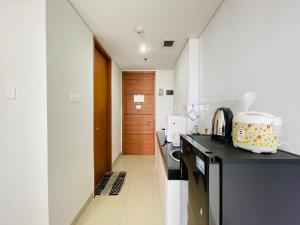 Cozy Studio Room at Dago Suites By Travelio
