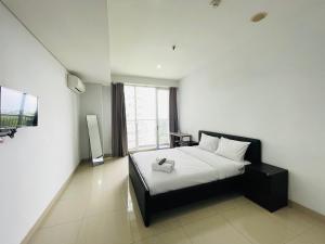 Cozy Studio Room at Dago Suites By Travelio