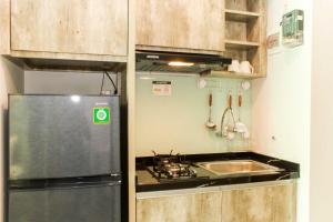 Cozy and Nice Studio at Grand Kamala Lagoon Apartment By Travelio