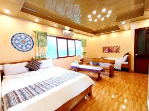 Phòng Bốn Người Có Phòng Tắm Riêng (Quadruple Room with Private Bathroom)