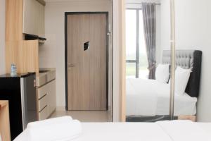 Cozy Studio at Monroe Tower Apartment By Travelio