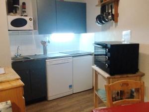 Appartements Appartement ski-in/ski-out, 2 pieces, pour 6, proche ecole de ski - FR-1-771-78 : photos des chambres