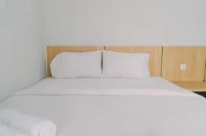 Simply and Comfort Living 2BR at Transpark Bintaro Apartment By Travelio - Mencil