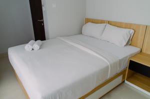 Simply and Comfort Living 2BR at Transpark Bintaro Apartment By Travelio