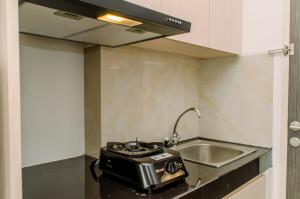 Restful and Comfy Studio at Serpong Garden Apartment By Travelio