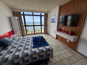 Flat Golden Beach beira mar