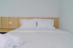 Elegant and Comfy 2BR Transpark Bintaro Apartment By Travelio - Mencil