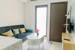 Elegant and Comfy 2BR Transpark Bintaro Apartment By Travelio