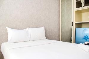 New and Cozy Studio at Patraland Urbano Apartment By Travelio