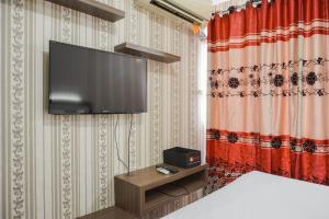 Cozy Living Studio Apartment at Belmont Residence Puri By Travelio