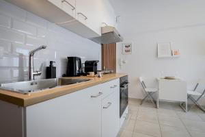 AT Home Apartments B1