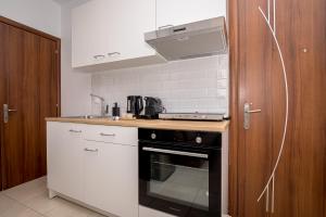 AT Home Apartments B1