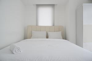 Elegant 1BR Apartment at M-Town Residence near Summarecon Mall By Travelio