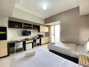 Cozy Studio Room No Kitchen at Skyland City Jatinangor Apartment By Travelio