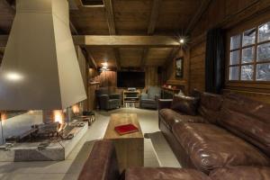 Chalet lOurson, avec jacuzzi, sauna, services hôteliers