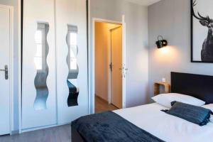 Appartements Triplex 5 personnes au calme : photos des chambres