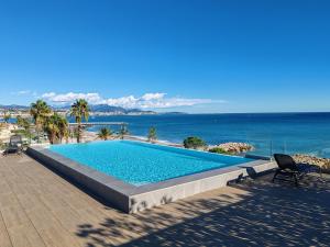 Appartements Pearl Beach - Rooftop Pool Seaside : photos des chambres