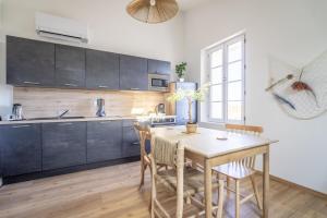 Appartements Louis XIV, Le Somail. : photos des chambres