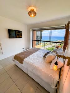 Beach front 9 min to airport DosLocosDeViaje