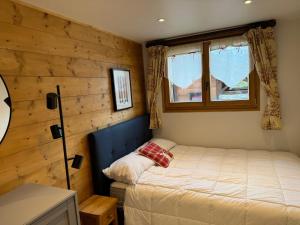 Chalet familial avec jacuzzi et cheminée près des pistes - FR-1-623-363