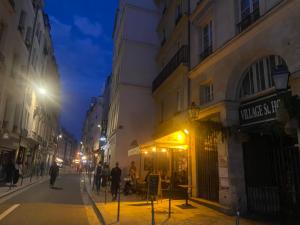 Appartements ParisLouvreSamaritaineCharme : photos des chambres