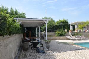 Marlù Luxury Rooms Pool and Garden