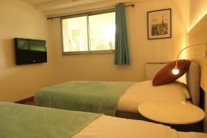 Appartements Appartement familial au bord de la Marne, jardin tropical , piscine, tennis, terrasse, parking gratuit proche Disneyland : photos des chambres