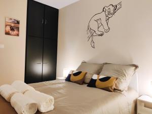 Appartements CasaSimba - Appartement 8 min de Disneyland ! : photos des chambres