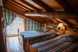 Appartements Appartement cosy pour 4 personnes en chalet de pierres : photos des chambres