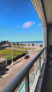 Cantinho Sol & Mar Pé na Areia frente ao Mar com churrasqueira na sacada e piscina